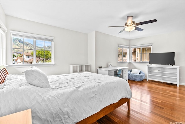 1000 Kaolo St, Honolulu, HI 96825 - bedroom featuring wood finished floors and a ceiling fan