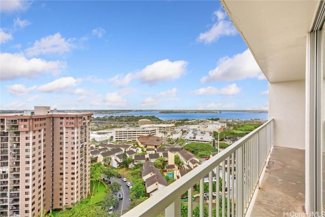 balcony featuring a water view