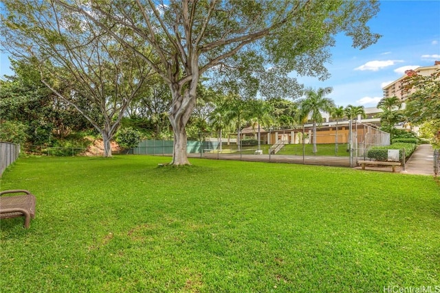 view of yard with fence