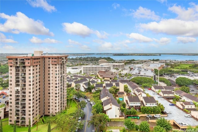 drone / aerial view featuring a water view and a view of city