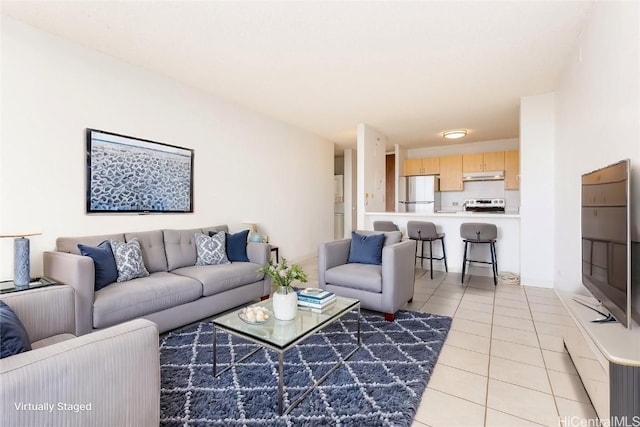 living area with light tile patterned flooring