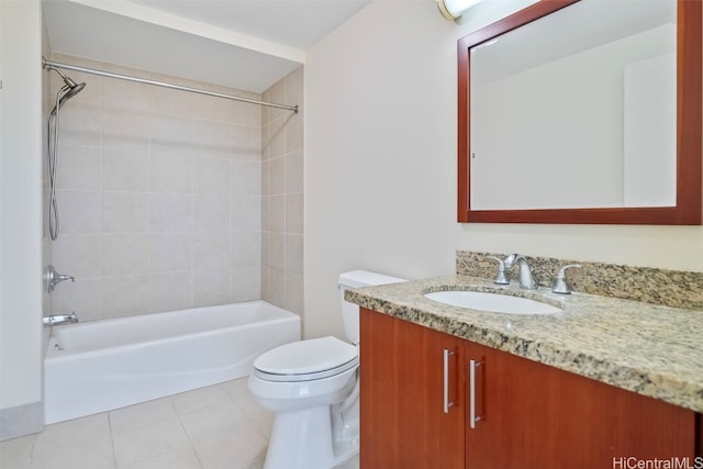 full bath featuring toilet, tile patterned floors, vanity, and bathing tub / shower combination