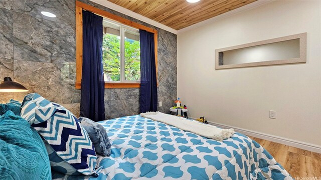 947 Uwao St Unit C, Honolulu, HI 96825 - bedroom with ornamental molding, wood finished floors, baseboards, and wooden ceiling