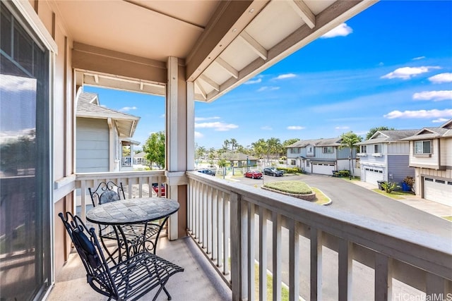 balcony featuring a residential view