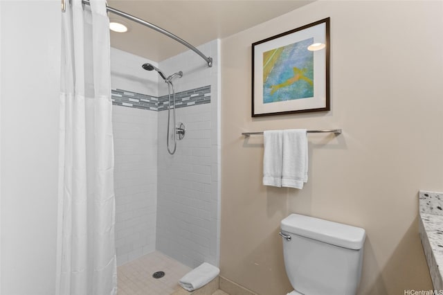 1777 Ala Moana Blvd Unit 2307, Honolulu, HI 96815 - full bath featuring toilet, tiled shower, and baseboards