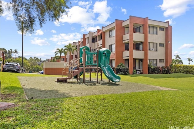 community playground featuring a yard