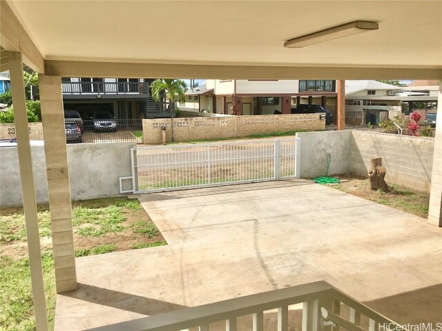 view of patio / terrace featuring a gate and a fenced front yard
