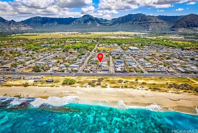 drone / aerial view featuring a mountain view