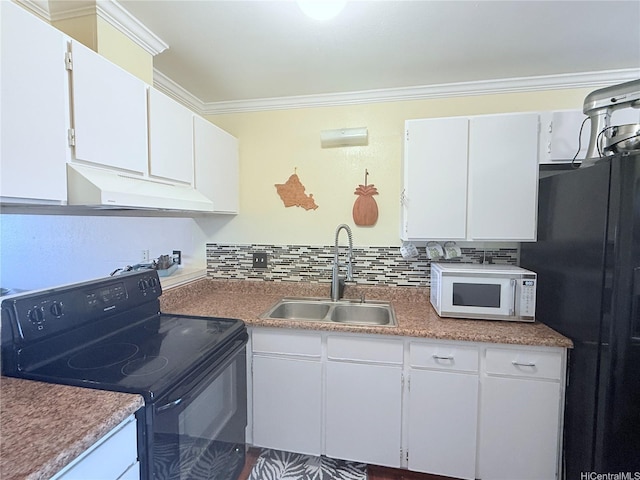 kitchen with crown molding, black appliances, under cabinet range hood, decorative backsplash, and a sink