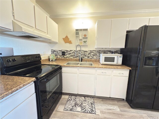 94-637 Kahakea St Unit 3I, Waipahu, HI 96797 - kitchen with black appliances, a sink, under cabinet range hood, ornamental molding, and decorative backsplash