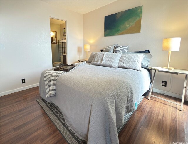 94-637 Kahakea St Unit 3I, Waipahu, HI 96797 - bedroom featuring wood finished floors and baseboards