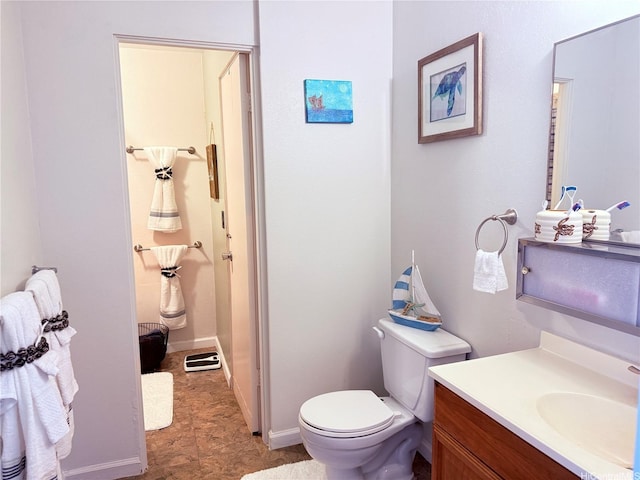 94-637 Kahakea St Unit 3I, Waipahu, HI 96797 - bathroom with vanity, toilet, and baseboards