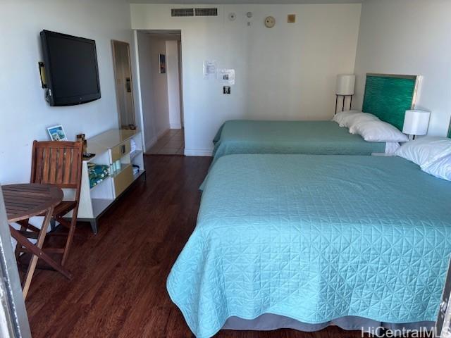 1850 Ala Moana Blvd Unit 818, Honolulu, HI 96815 - bedroom featuring wood finished floors and baseboards