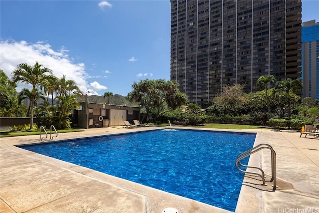 pool with a patio