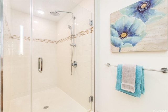 full bathroom featuring a shower stall