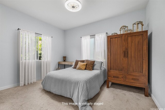 1736 Gulick Ave, Honolulu, HI 96819 - bedroom with baseboards and light carpet
