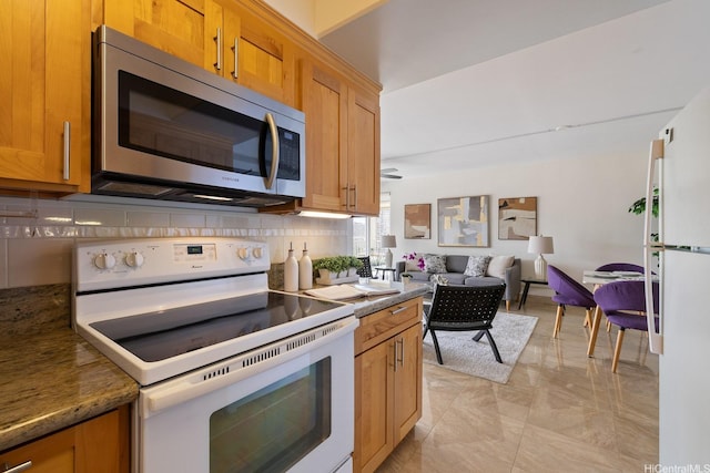 419 Atkinson Dr Unit 1603, Honolulu, HI 96814 - kitchen featuring white appliances, backsplash, light marble finish floors, and brown cabinets