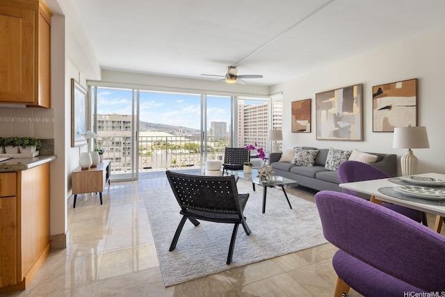 419 Atkinson Dr Unit 1603, Honolulu, HI 96814 - living room with ceiling fan and light marble finish flooring