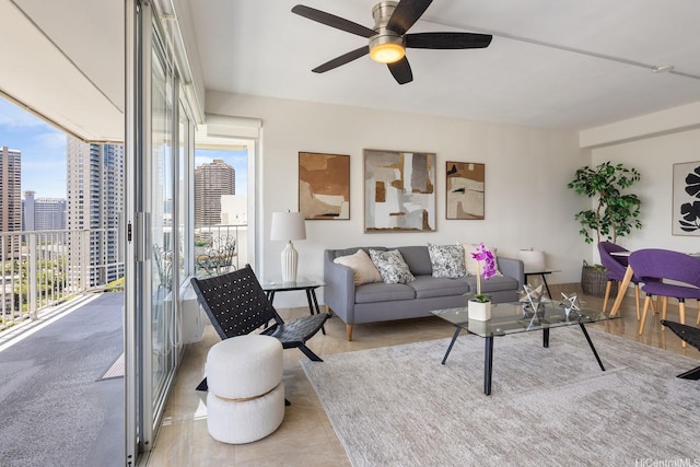 419 Atkinson Dr Unit 1603, Honolulu, HI 96814 - tiled living area with a view of skyline and a ceiling fan