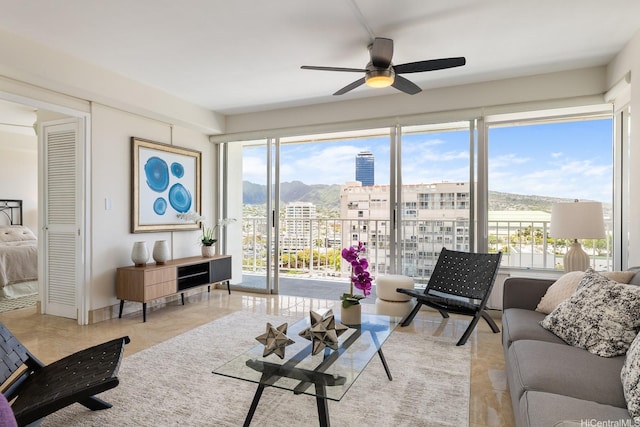 419 Atkinson Dr Unit 1603, Honolulu, HI 96814 - living area with ceiling fan, a mountain view, and a city view
