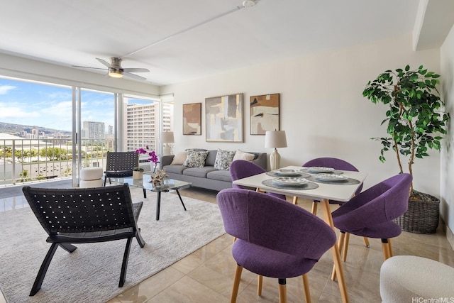 419 Atkinson Dr Unit 1603, Honolulu, HI 96814 - living room featuring ceiling fan and a city view