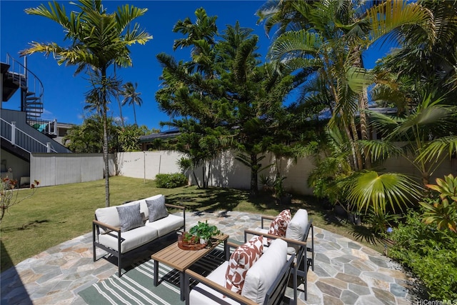 61 Kai One Pl, Kailua, HI 96734 - fenced backyard with an outdoor hangout area and a patio