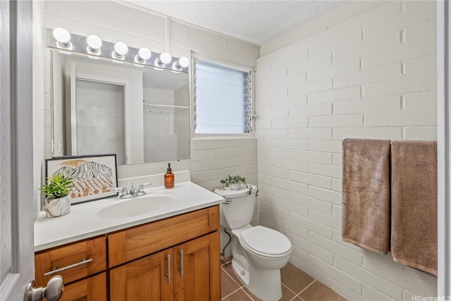 61 Kai One Pl, Kailua, HI 96734 - full bath featuring vanity, tile patterned floors, a textured ceiling, and brick wall