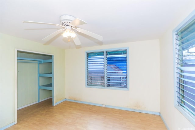 87-118 Alapaki St, Waianae, HI 96792 - unfurnished bedroom with wood finished floors, multiple windows, and a closet