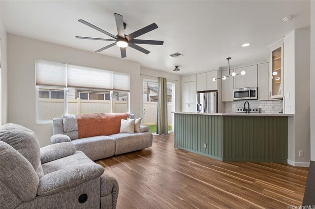 91-1159 Kanela St Unit M30, Ewa Beach, HI 96706 - living room featuring ceiling fan, dark wood-type flooring, recessed lighting, and baseboards