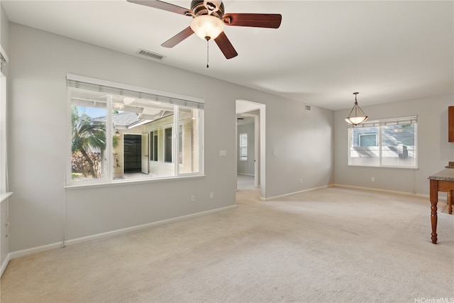 91-1036 Kaiuliuli St, Ewa Beach, HI 96706 - spare room featuring plenty of natural light, light colored carpet, and baseboards