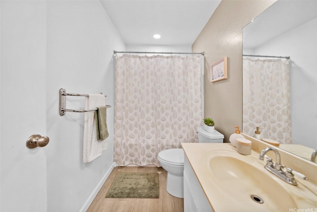 46-269 Kahuhipa St Unit D202, Kaneohe, HI 96744 - bathroom with wood finished floors, vanity, a shower with shower curtain, and recessed lighting