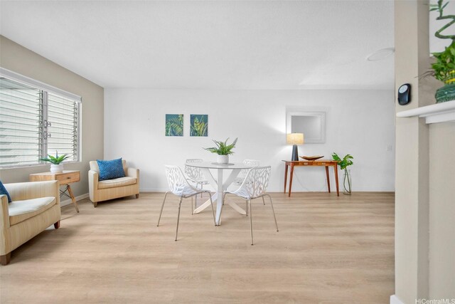 46-269 Kahuhipa St Unit D202, Kaneohe, HI 96744 - dining room with light wood finished floors and baseboards