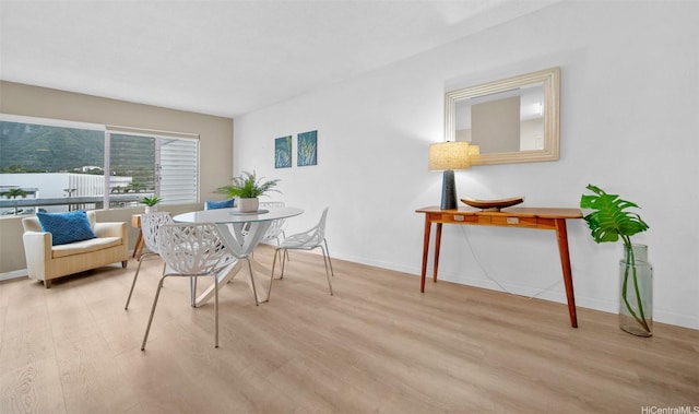 46-269 Kahuhipa St Unit D202, Kaneohe, HI 96744 - dining room with wood finished floors and baseboards