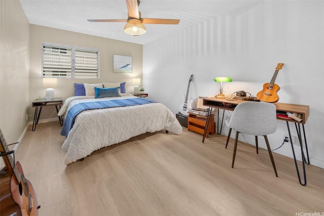 46-269 Kahuhipa St Unit D202, Kaneohe, HI 96744 - bedroom featuring wood finished floors and ceiling fan