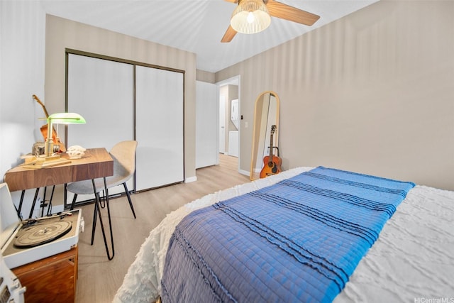 46-269 Kahuhipa St Unit D202, Kaneohe, HI 96744 - bedroom with wood finished floors, a closet, and ceiling fan