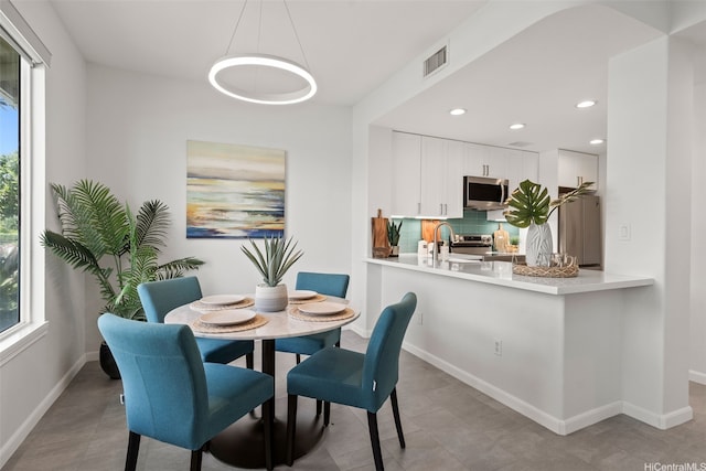 520 Lunalilo Home Rd Unit V1406, Honolulu, HI 96825 - dining space with recessed lighting, baseboards, and light tile patterned floors