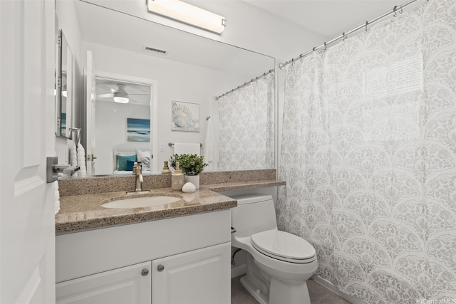 520 Lunalilo Home Rd Unit V1406, Honolulu, HI 96825 - ensuite bathroom featuring toilet, vanity, and a ceiling fan