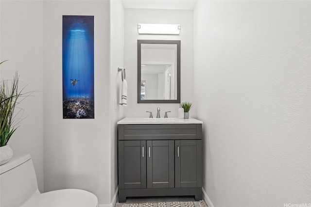 520 Lunalilo Home Rd Unit V1406, Honolulu, HI 96825 - bathroom featuring baseboards, toilet, and vanity