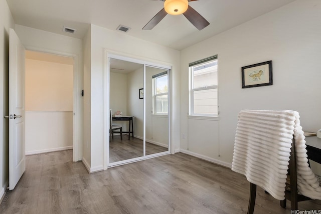 91-6221 Kapolei Pkwy Unit 511, Ewa Beach, HI 96706 - office area with a ceiling fan, wood finished floors, and baseboards