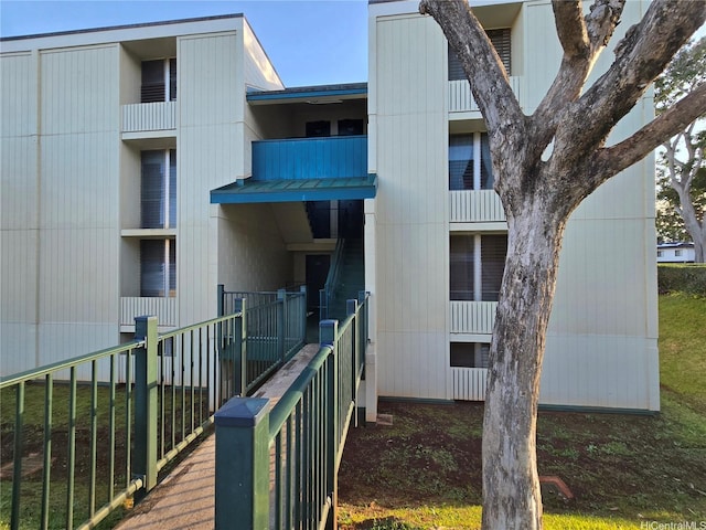 view of property featuring fence
