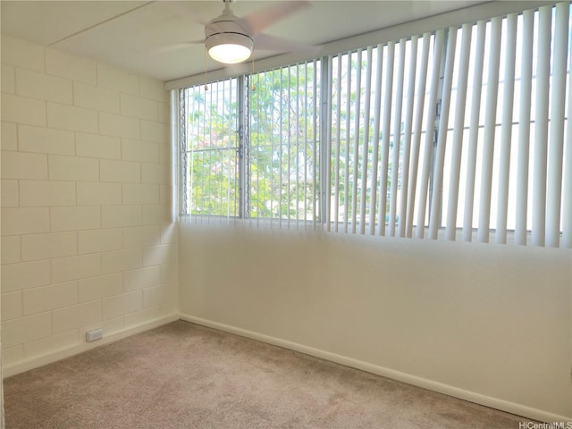 95-029 Kuahelani Ave Unit 331, Mililani, HI 96789 - carpeted spare room featuring a ceiling fan and baseboards