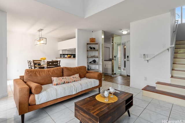 94-835 Lumiauau St Unit K105, Waipahu, HI 96797 - living area featuring stairway and light tile patterned floors