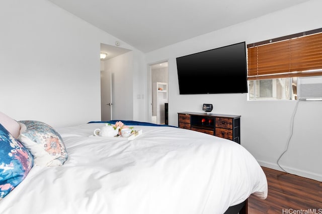 94-835 Lumiauau St Unit K105, Waipahu, HI 96797 - bedroom featuring lofted ceiling, wood finished floors, and baseboards