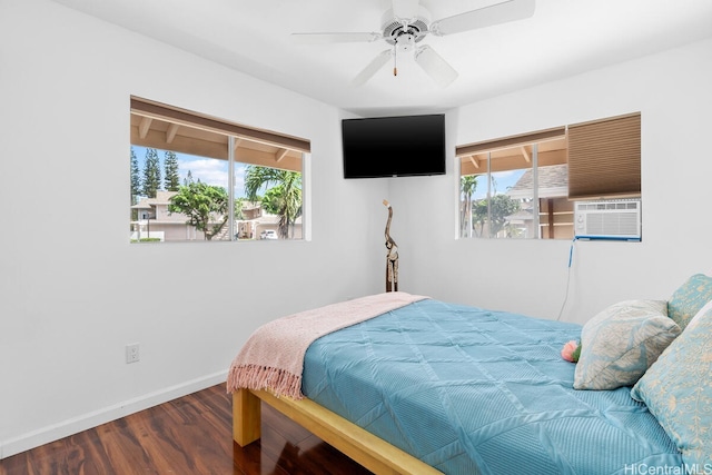 94-835 Lumiauau St Unit K105, Waipahu, HI 96797 - bedroom with wood finished floors, baseboards, cooling unit, and ceiling fan