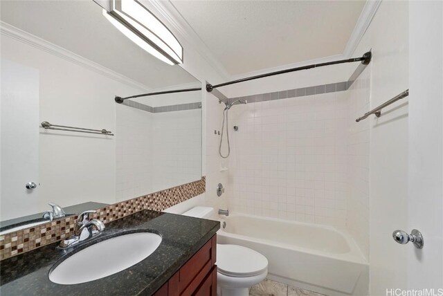 full bathroom with  shower combination, vanity, toilet, and crown molding