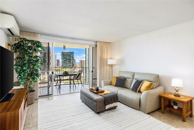 living area with light tile patterned flooring, a city view, and an AC wall unit
