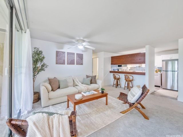 46-109 Konohiki St Unit 3913, Kaneohe, HI 96744 - living room featuring light carpet and a ceiling fan
