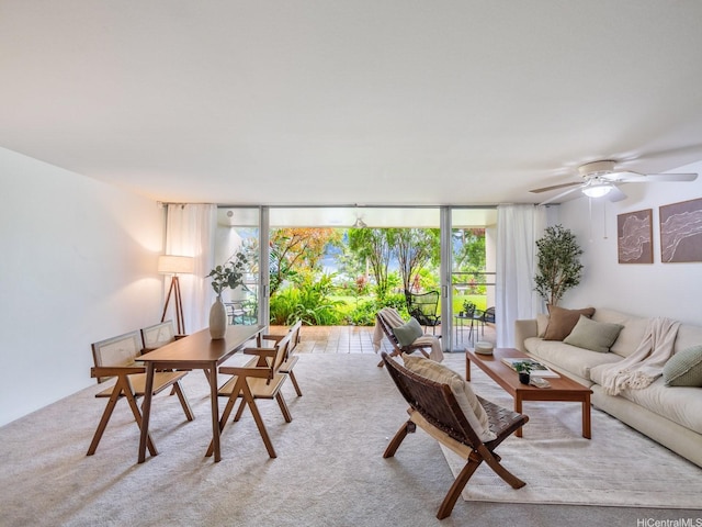46-109 Konohiki St Unit 3913, Kaneohe, HI 96744 - living area with floor to ceiling windows, ceiling fan, and light colored carpet