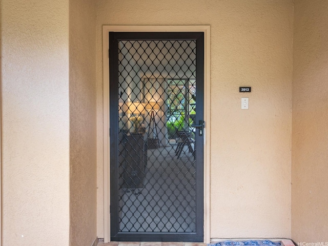 46-109 Konohiki St Unit 3913, Kaneohe, HI 96744 - doorway to property with stucco siding and a gate