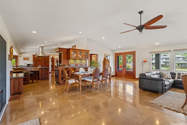 dining room featuring plenty of natural light, french doors, recessed lighting, and lofted ceiling